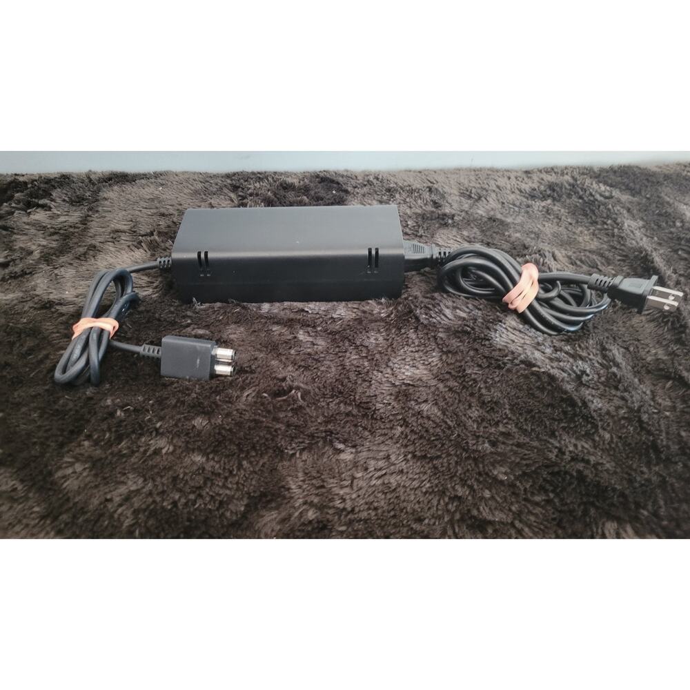 Official Microsoft Xbox 360 Slim power supply / AC adapter.